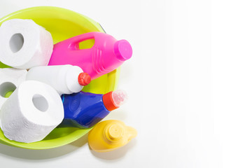 Cleaning and repair products, household chemicals, rubber gloves, green basin for cleaning the apartment and office