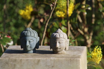 buddha heads sculptures at municipal cemetery in Amsterdam, The Netherlands