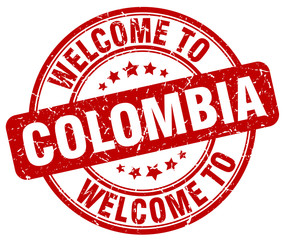 welcome to Colombia red round vintage stamp
