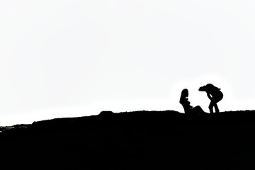 Silhouette of a photographer who was photographing models