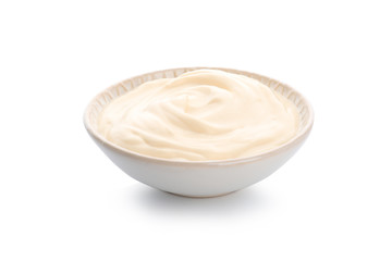 Bowl of tasty yogurt on white background