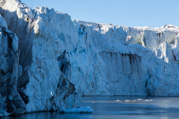 close view front of natural Esmarkbreen glacier in Spitsbergen