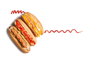 Tasty hot dogs on white background