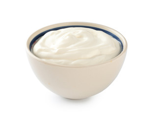 Bowl with tasty yogurt on white background