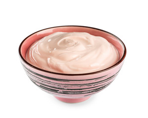 Bowl with tasty yogurt on white background