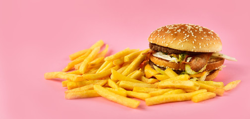 urger with fries. takeaway lunch, fast food restaurant, fast food menu. pink  background, selective...