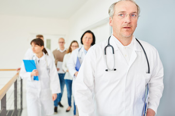 Fototapeta premium Senior man as chief executive doctor