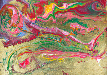 Multicolored gold marbling pattern. Golden marble liquid texture.