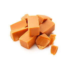 Tasty sweet caramel on white background