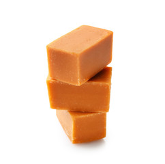 Tasty sweet caramel on white background