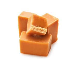 Tasty sweet caramel on white background