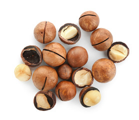 Tasty macadamia nuts on white background