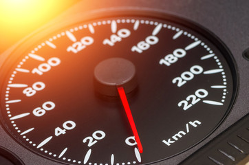 Close up shot of a speedometer in a car