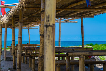 nipa hut beside beach in philippines