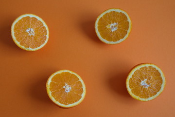 High angle view of the oranges on a orange background