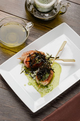 Bacon-wrapped scallop skewers