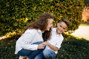Fototapeta premium Mother and son together park