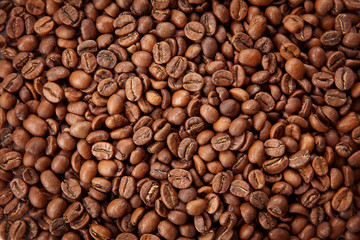 Roasted coffee beans texture. Close up view, top view