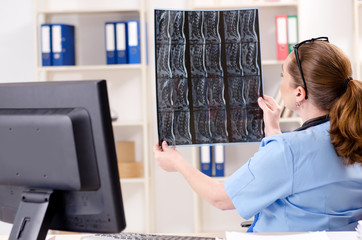 Female doctor radiologist working in the clinic 