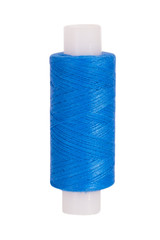 Blue sewing thread reel on white isolated background