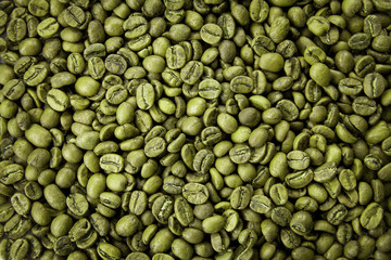 Green coffee beans texture. Close up view, top view