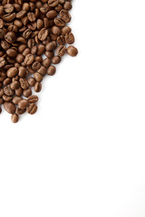 Close up view on Heap of coffee beans isolated on white background. Useful image for design with copy space