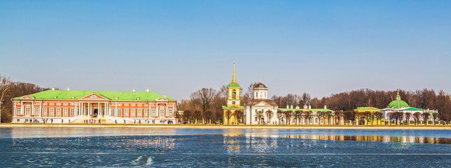 Manor Kuskovo on shore, covered with ice,  pond in Moscow
