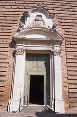 Fototapeta premium Entrance door of San Cristoforo alla Certosa church, Ferrara, Italy