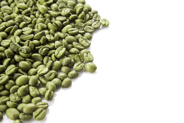Close up view on Heap of green coffee beans isolated on white background. Useful image for design with copy space
