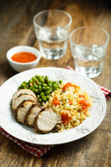 Pork with bulgur and green pea