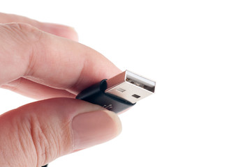 USB cable in the hands, isolated, closeup