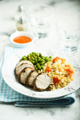 Pork with bulgur and green pea