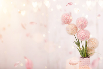 Flowers composition for Valentine's, Mother's or Women's Day. Pink flowers on old white wooden...
