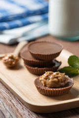 Homemade peanut butter cup, dark chocolate, dessert food.