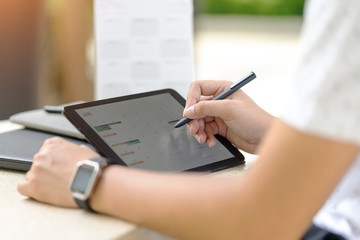 Man planning agenda and schedule using calendar event planner. Man hands using plan to vacation on...