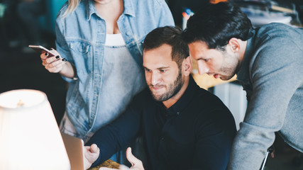 Business teamwork situation. Group of people discussing daily tasks in the office