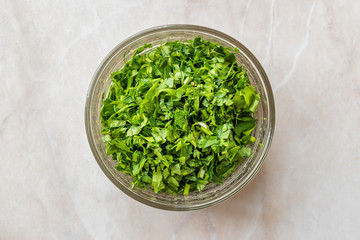 Chopped Parsley in Glass Bowl for Salad.