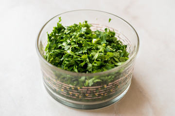 Chopped Parsley in Glass Bowl for Salad.