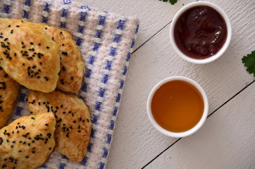   donut  and jam  on wooden table