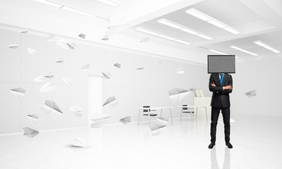 Businessman with TV instead of head.