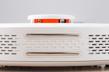 Fototapeta premium White robot vacuum cleaner