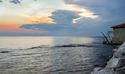 Sunset on the sea, with beautiful clouds.