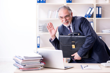 Fototapeta premium White bearded old businessman employee unhappy with excessive wo