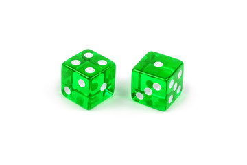 Two green glass dice isolated on white background. Four and one.