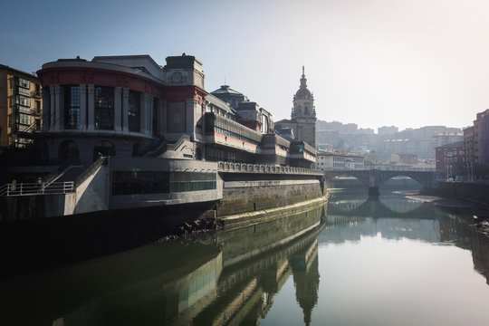 The Ribera market and the church of San Anton of Bilbao seen from the river