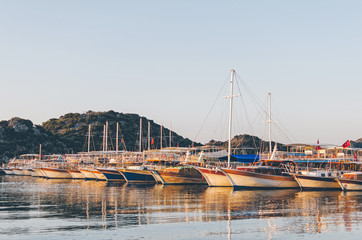 Obraz premium Passenger boats in Ucagis, Mediterranean Sea. District of Kekova, province of Antalya, Turkey