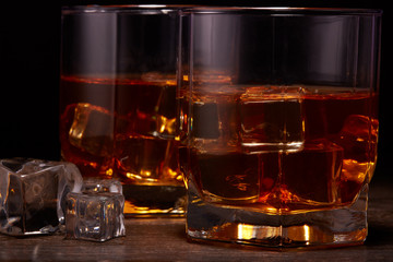 Glasses of whisky with ices
