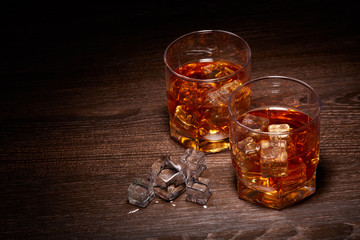 Glasses of whisky with ices