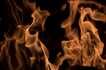 Faded fire flames on black background. Short shutter used. Great for background or overlay design