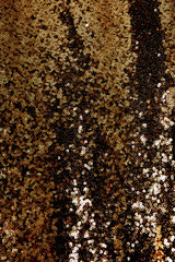 Abstract golden glitter background. Festive background with copy space.